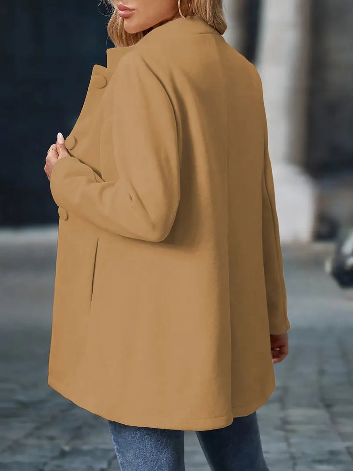 Camel coat back view showing stand collar and fit