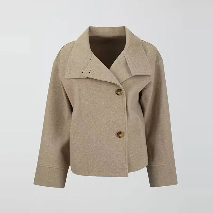 Beige cropped wool jacket on hanger front view