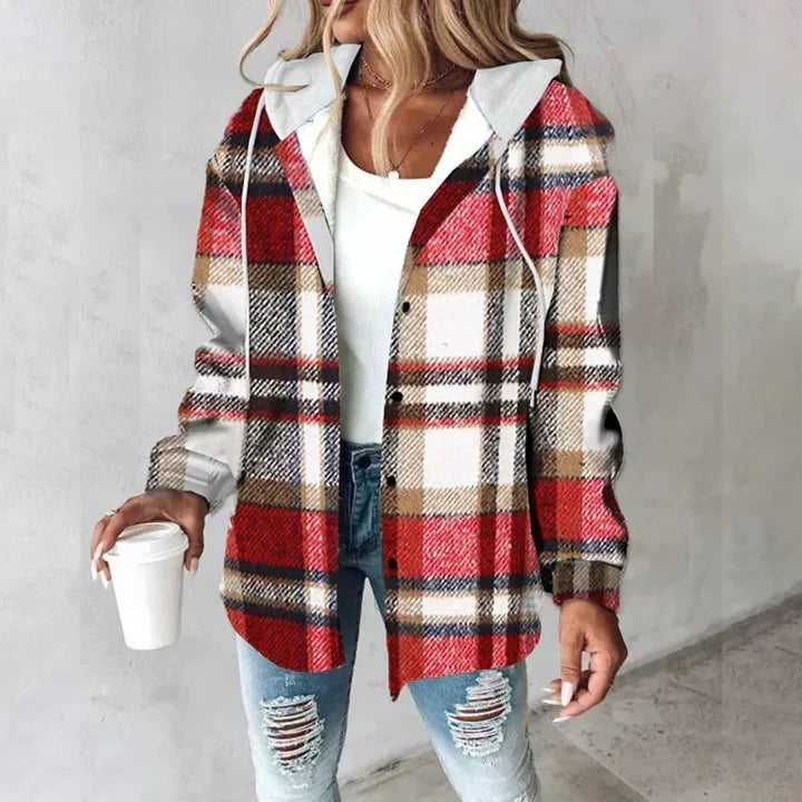 Woman wearing red and white plaid flannel shacket with gray hood
