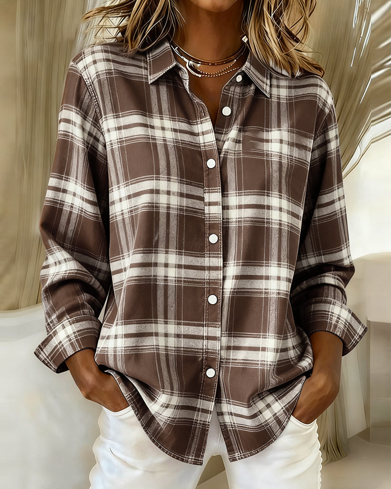 Woman wearing coffee brown and cream plaid overshirt