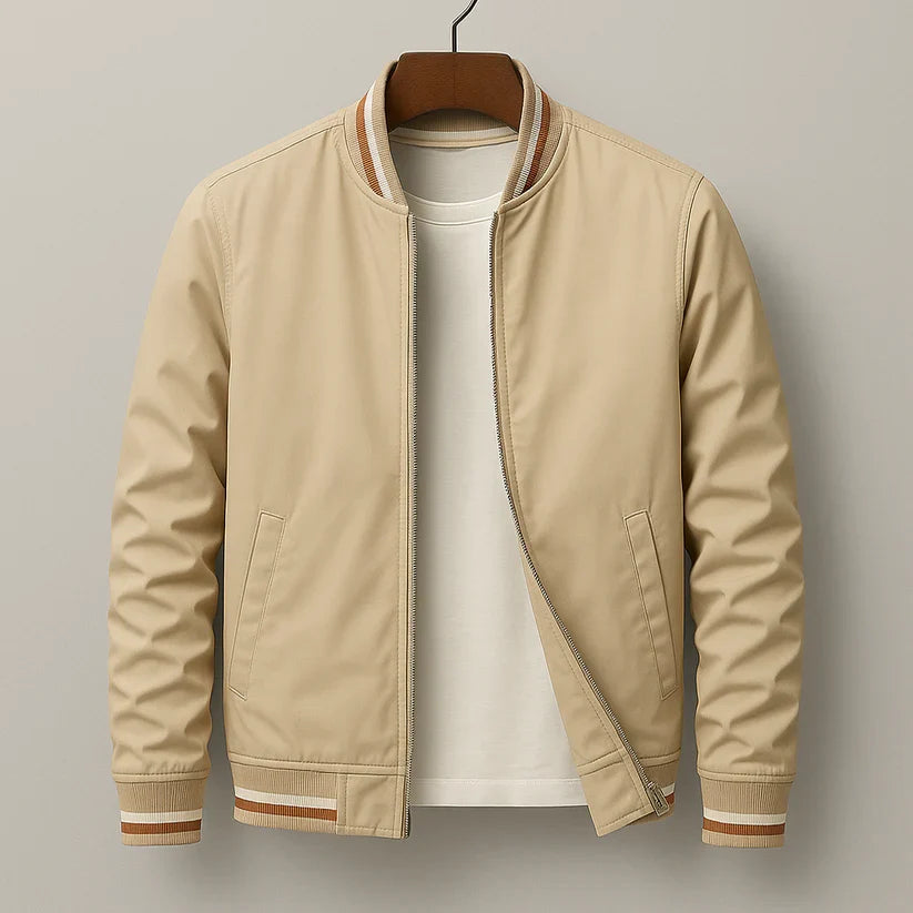 Beige bomber jacket with striped ribbed trim on hanger