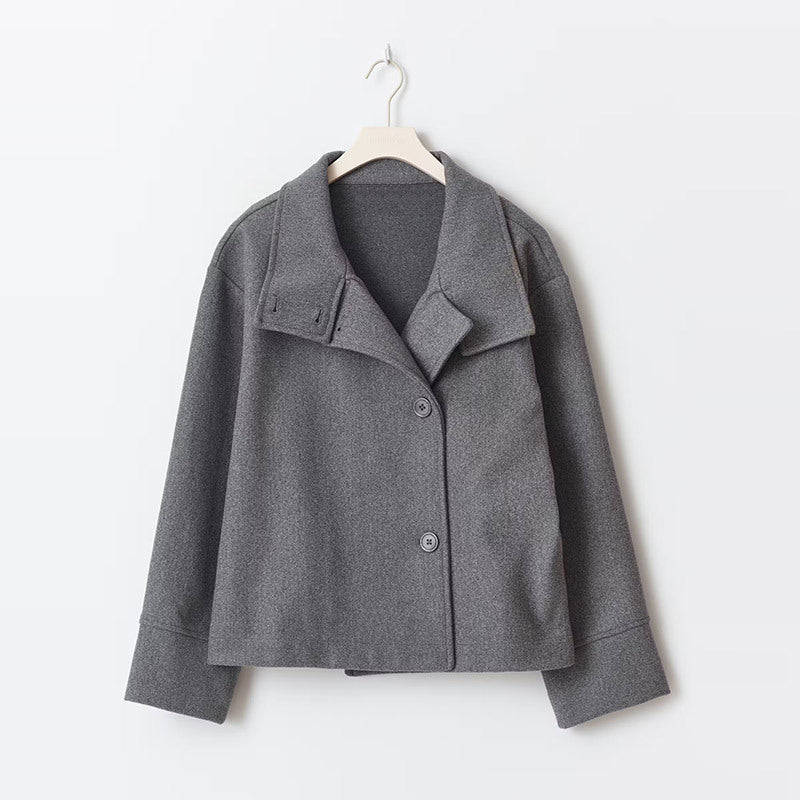 Dark gray cropped wool jacket on hanger front view