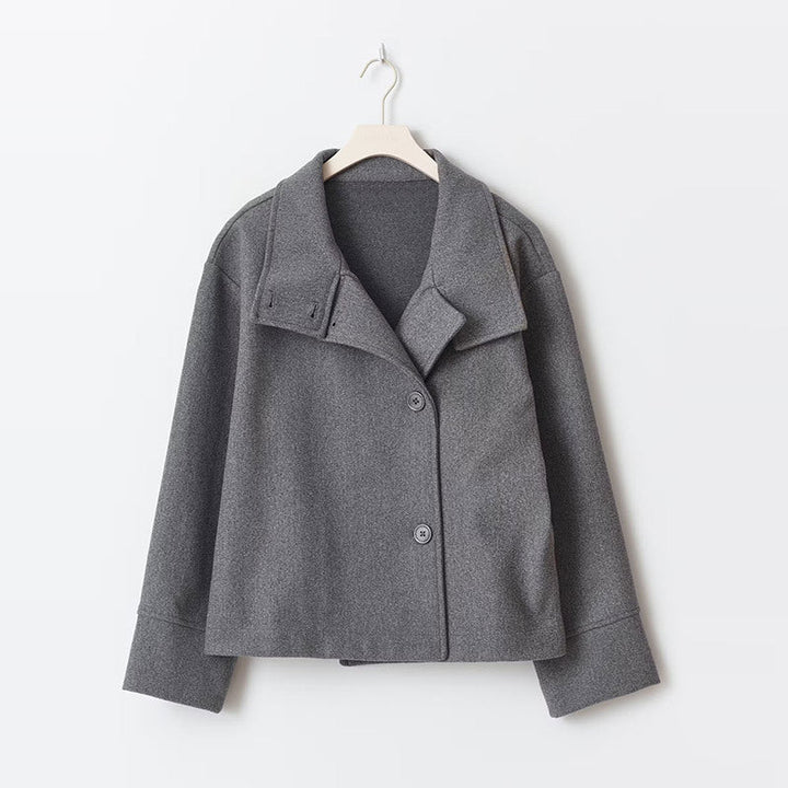 Dark gray cropped wool jacket on hanger front view
