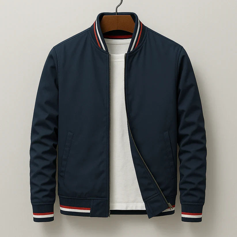 Navy bomber jacket with striped ribbed collar and cuffs on hanger