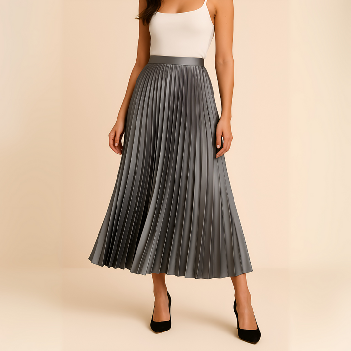 Woman wearing grey pleated high-waist midi skirt with heels