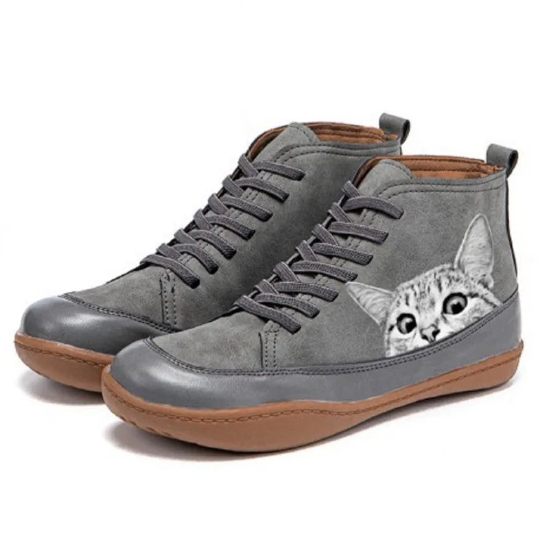 Gray high top boots with cat print detail, side view