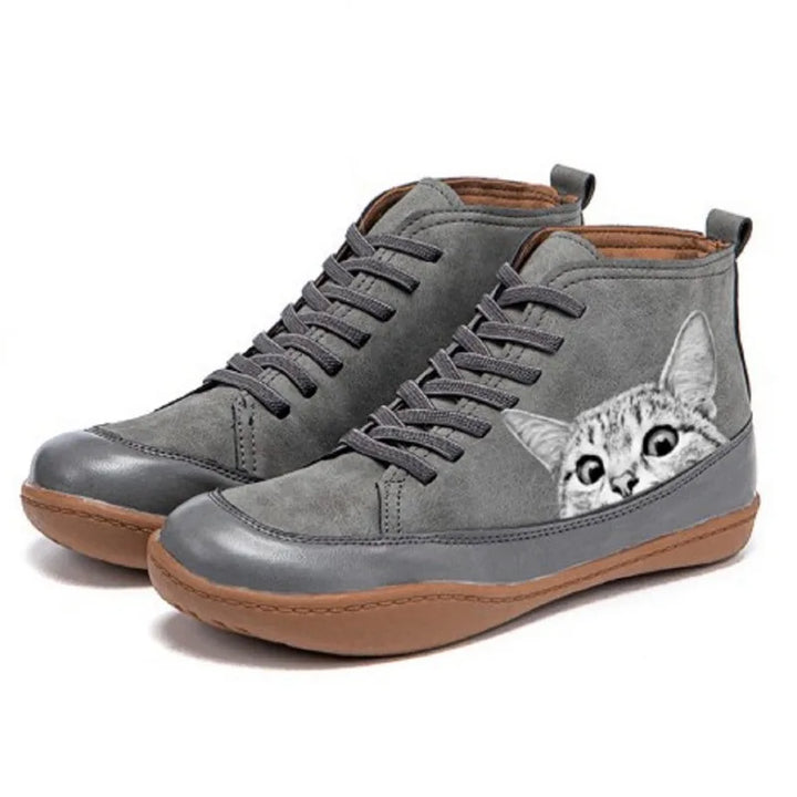 Gray high top boots with cat print detail, side view