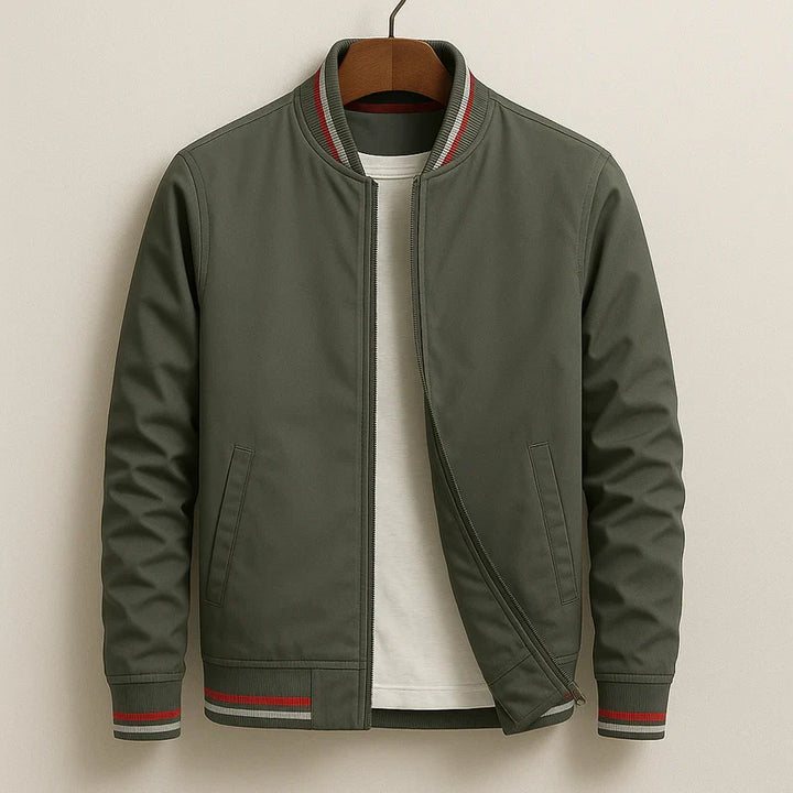 Olive green bomber jacket with striped ribbed collar and cuffs on hanger