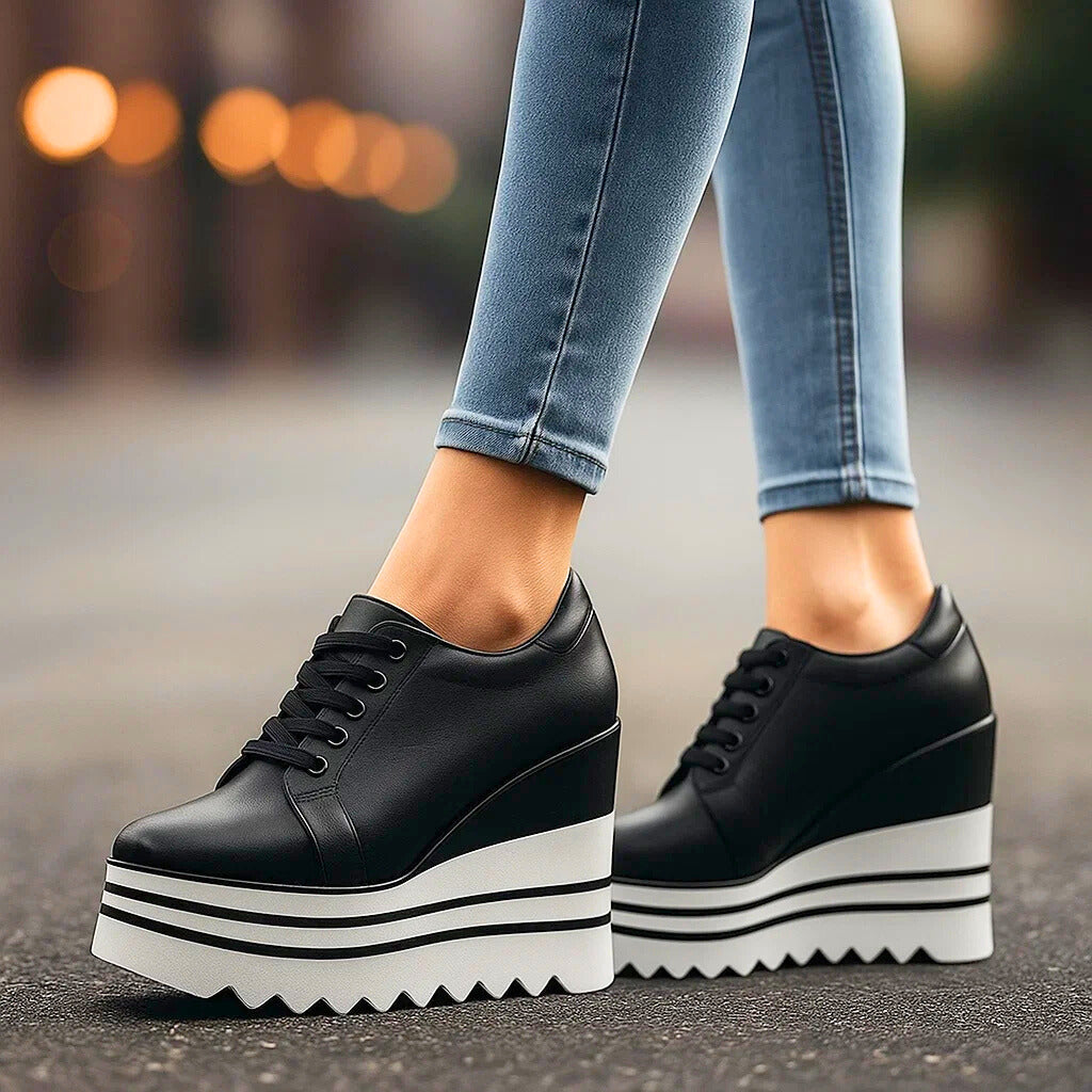 Black platform lace-up sneakers with layered white sole