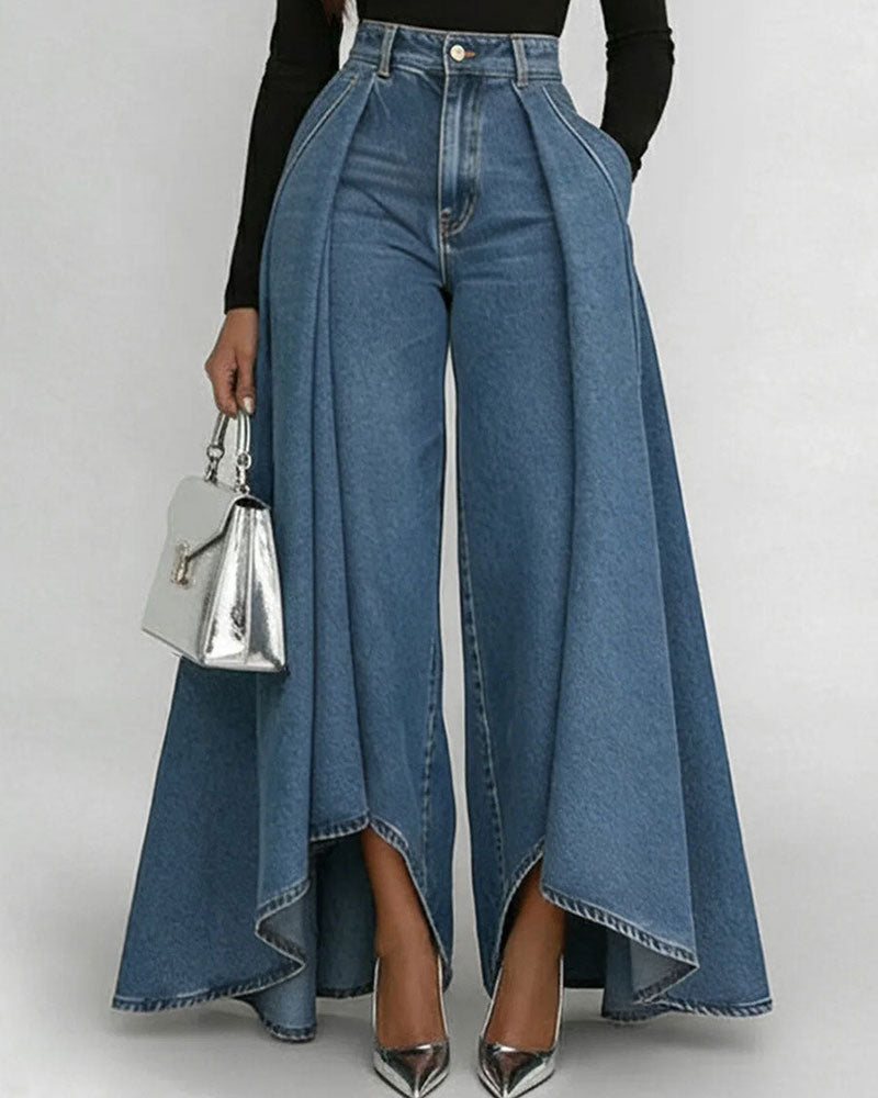 Woman wearing high waist wide leg blue denim jeans with pleated front, front view