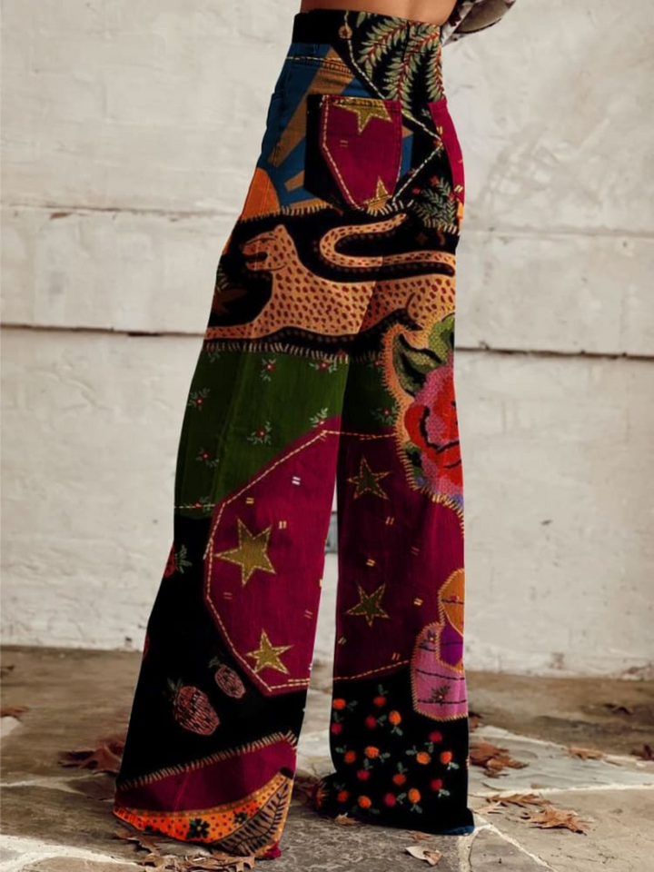 Wide leg patchwork print pants, side view showing back pocket