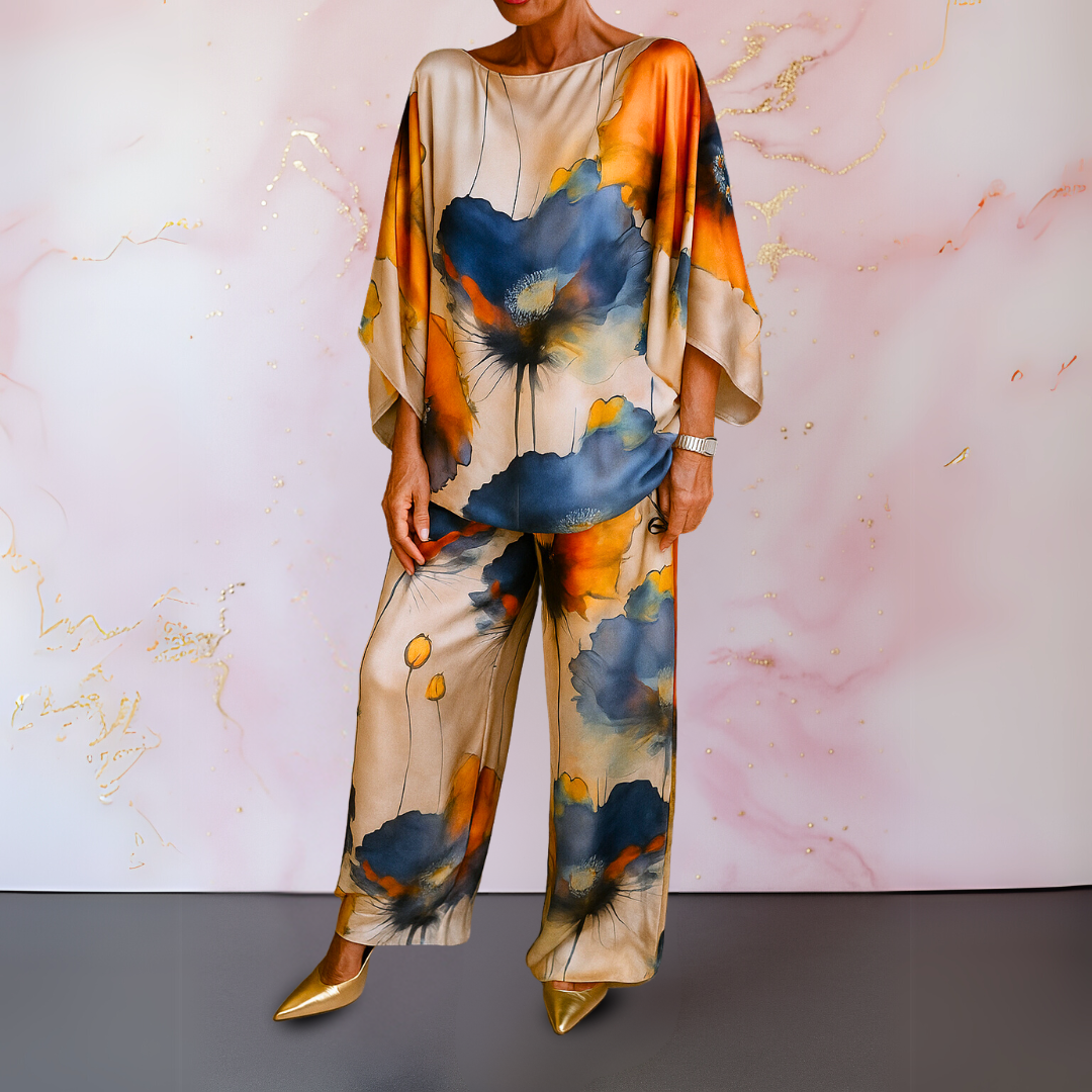 Woman wearing mandarin cream floral print satin two-piece set with wide leg pants