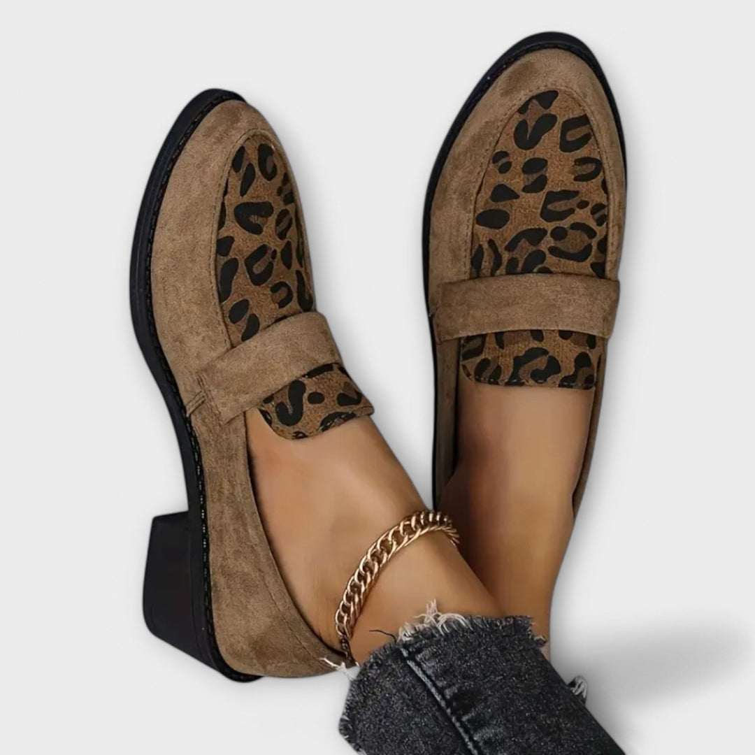 Pair of leopard print block heel loafers, top view