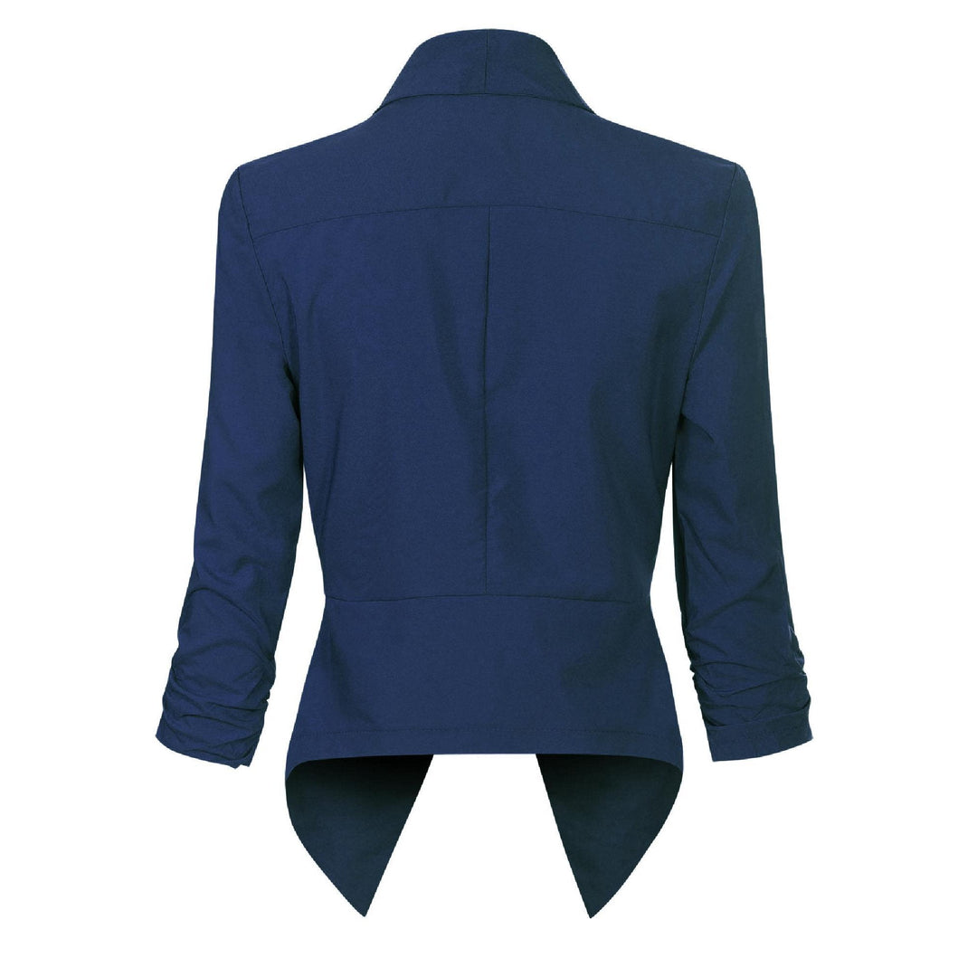 Navy open-front blazer, back view showing asymmetric hem