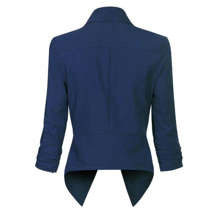 Navy open-front blazer, back view showing asymmetric hem