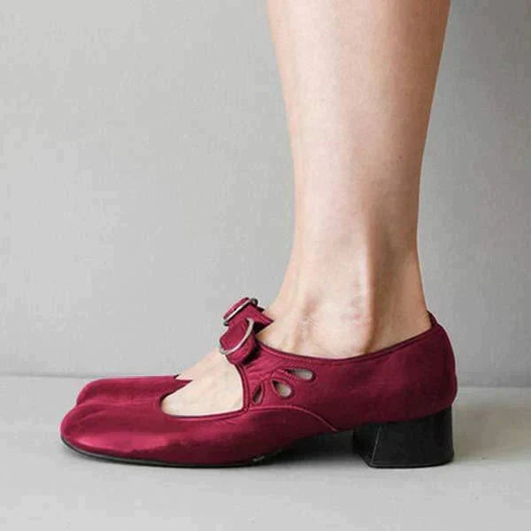 Red satin Mary Jane flat side view showing cutout detail