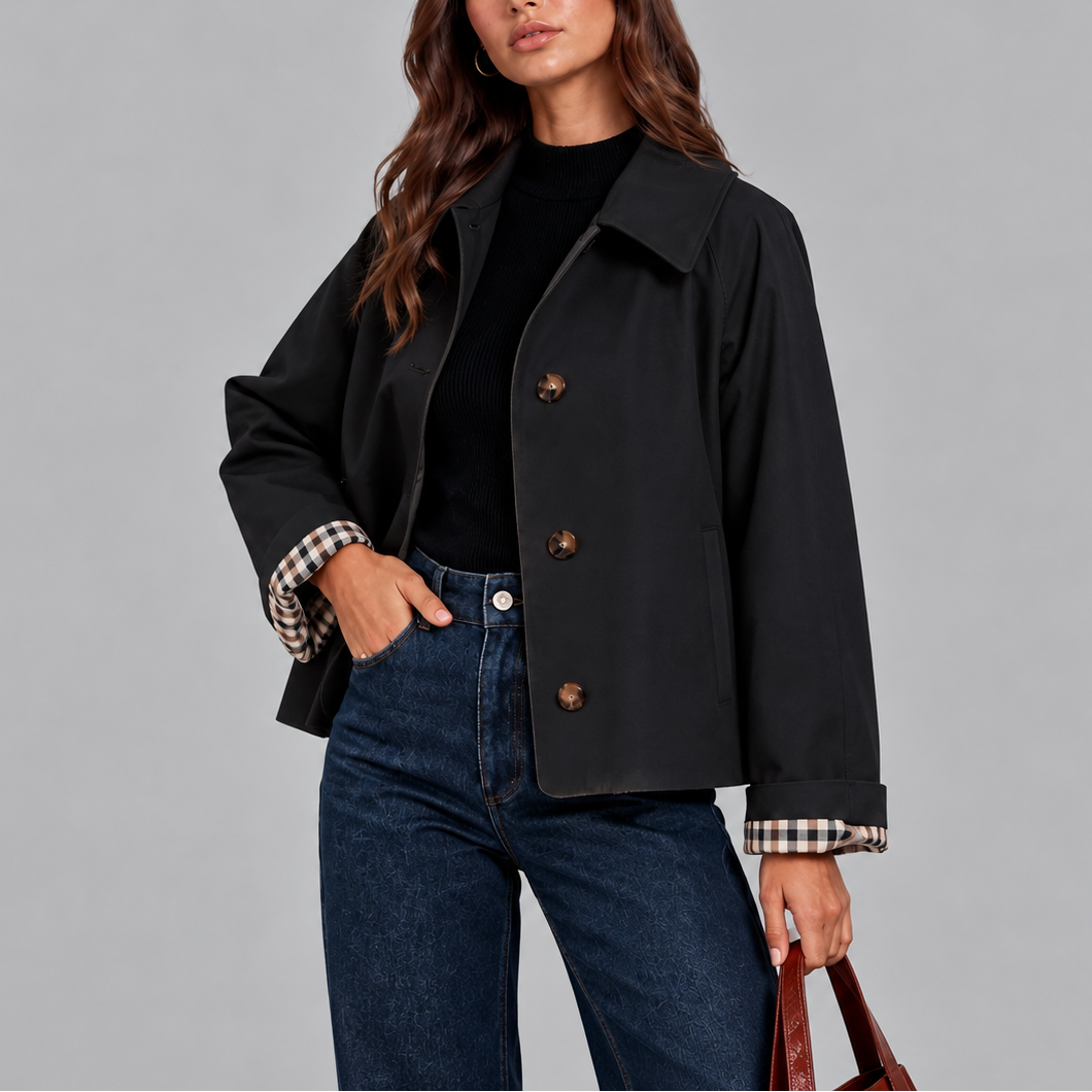 Black cropped trench jacket close up front view with buttons