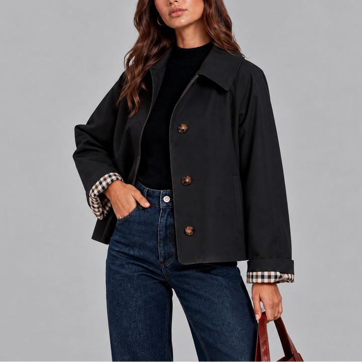 Black cropped trench jacket close up front view with buttons