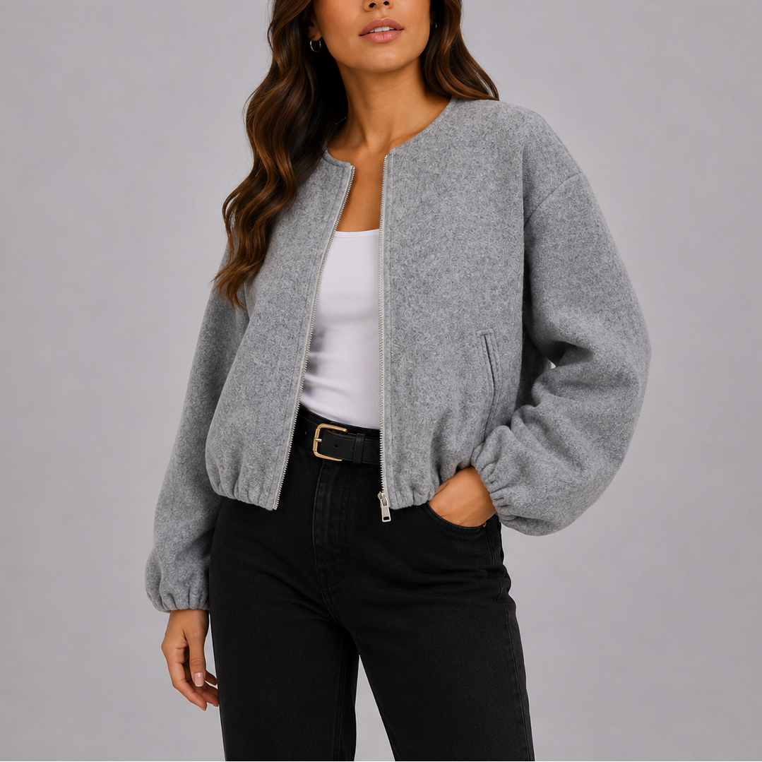 Gray bomber jacket with full zip front, worn open over white top