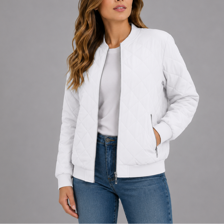 Woman wearing white quilted bomber jacket with zip pockets