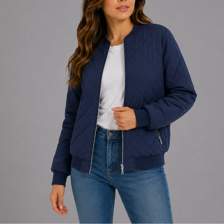 Woman wearing navy quilted bomber jacket with zip front