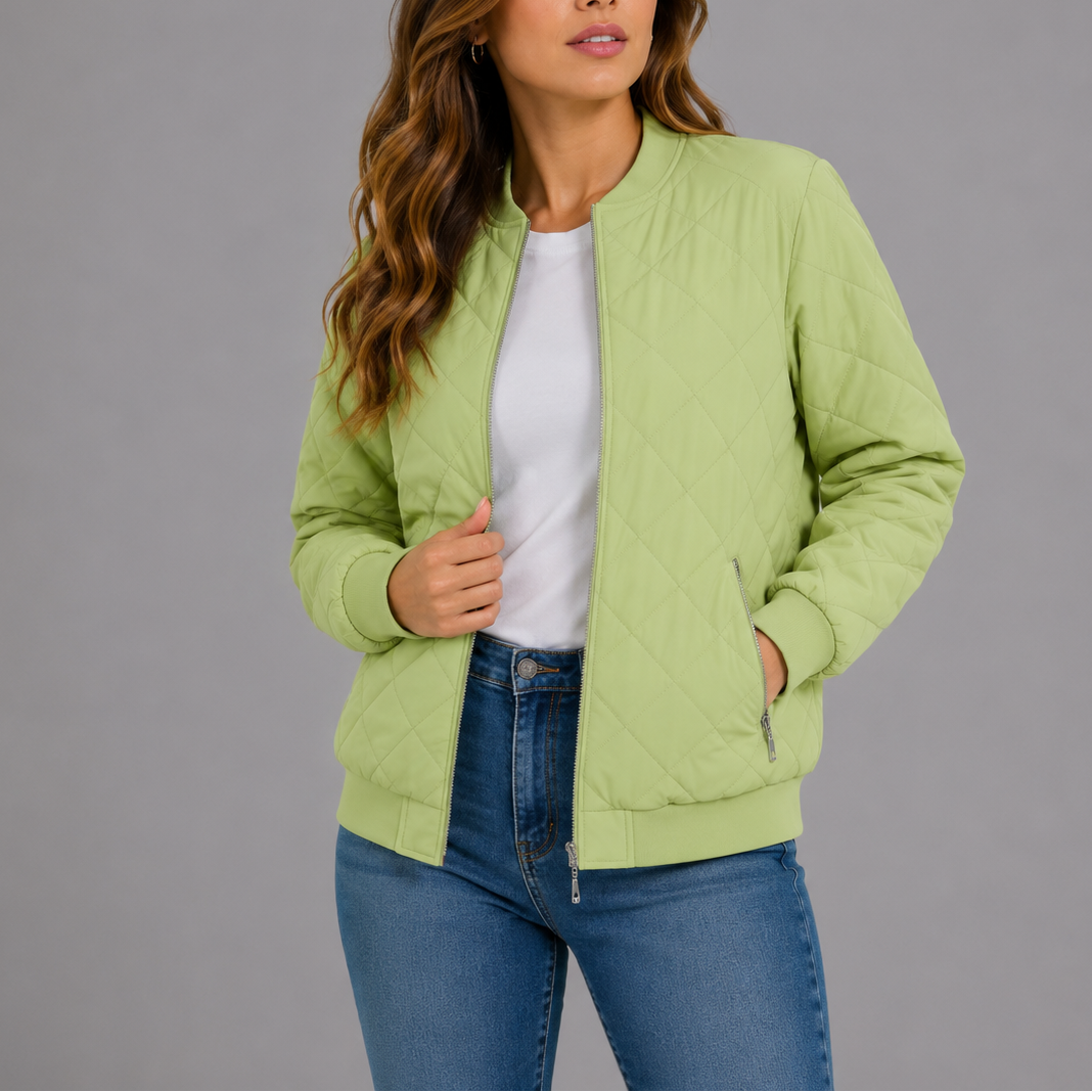 Woman wearing soft lime green quilted bomber jacket