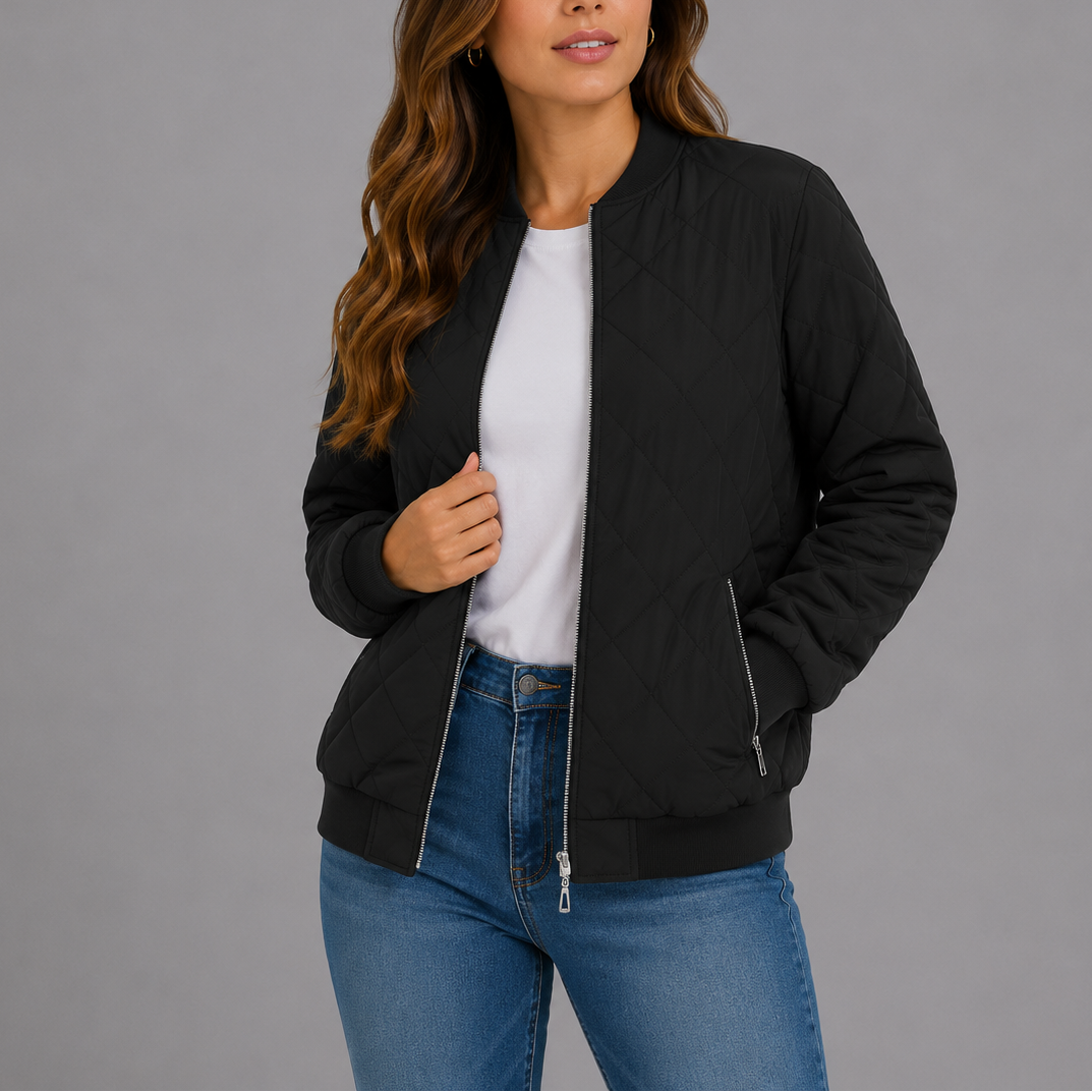 Woman wearing black quilted bomber jacket with zip pockets