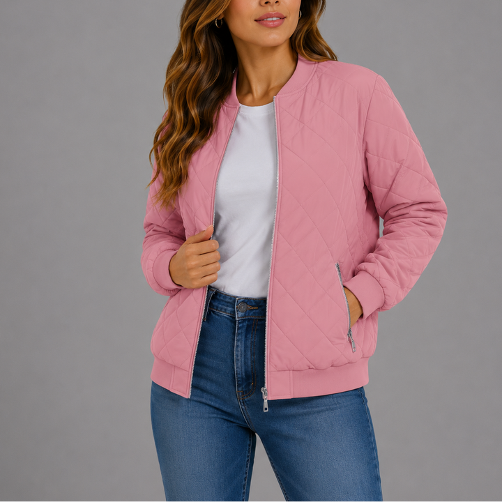 Woman wearing pink quilted bomber jacket