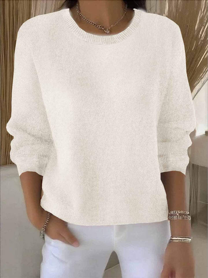Cream pullover sweater with dropped shoulder fit