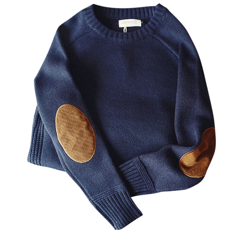 Blue oversized crew neck sweater with elbow patches, flat lay