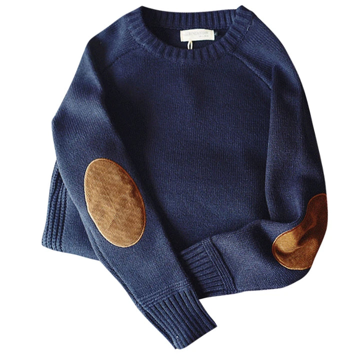 Blue oversized crew neck sweater with elbow patches, flat lay