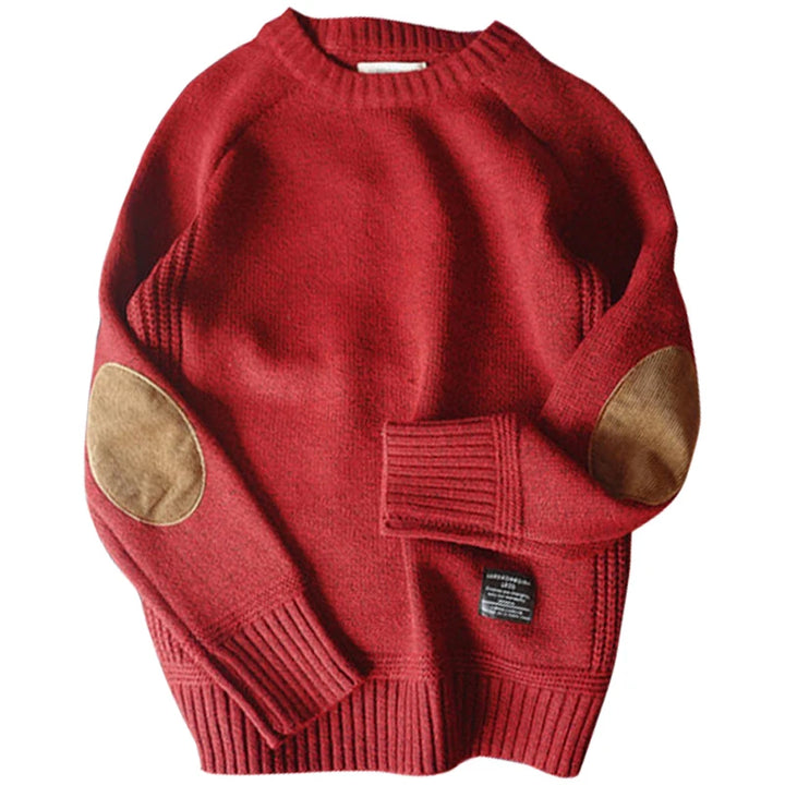 Red oversized crew neck sweater with elbow patches, flat lay