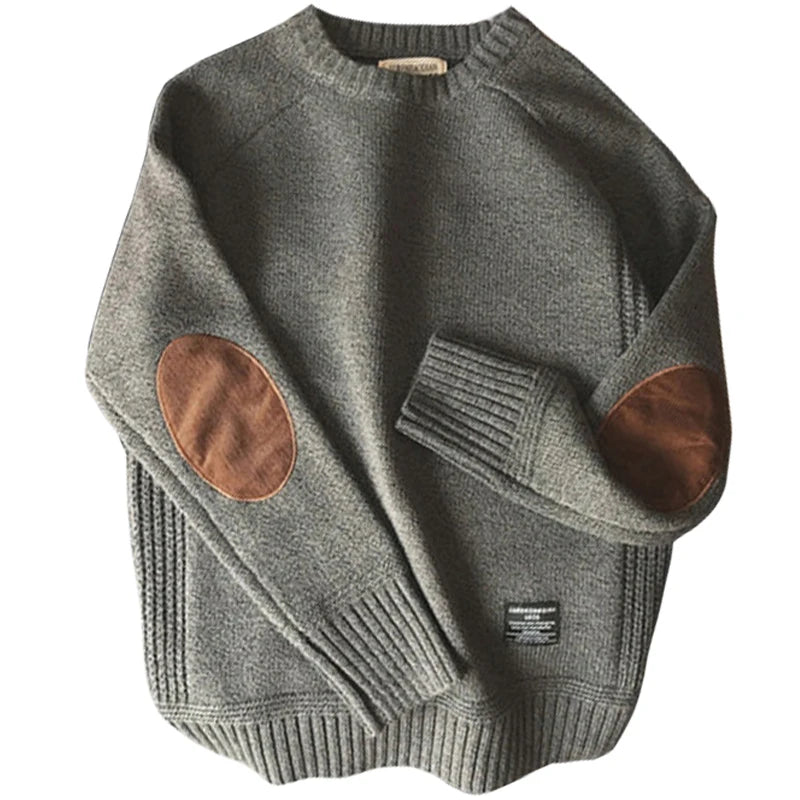Gray oversized crew neck sweater with elbow patches, flat lay