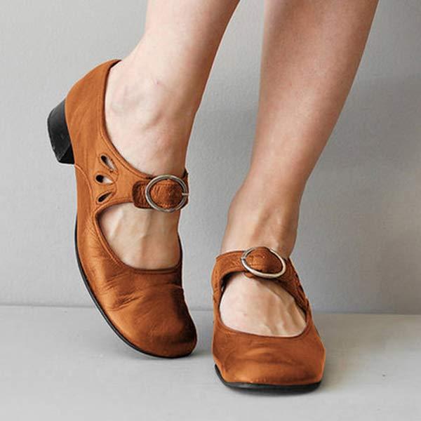 Khaki leather Mary Jane flats with buckle strap, front view on model