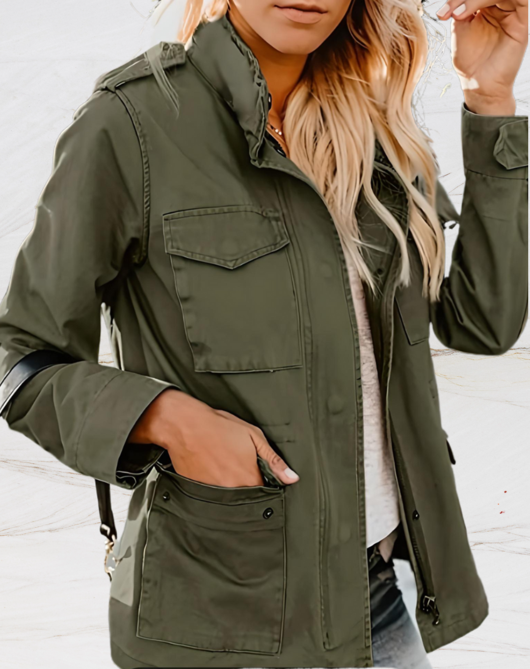 Olive green utility jacket with hand in pocket
