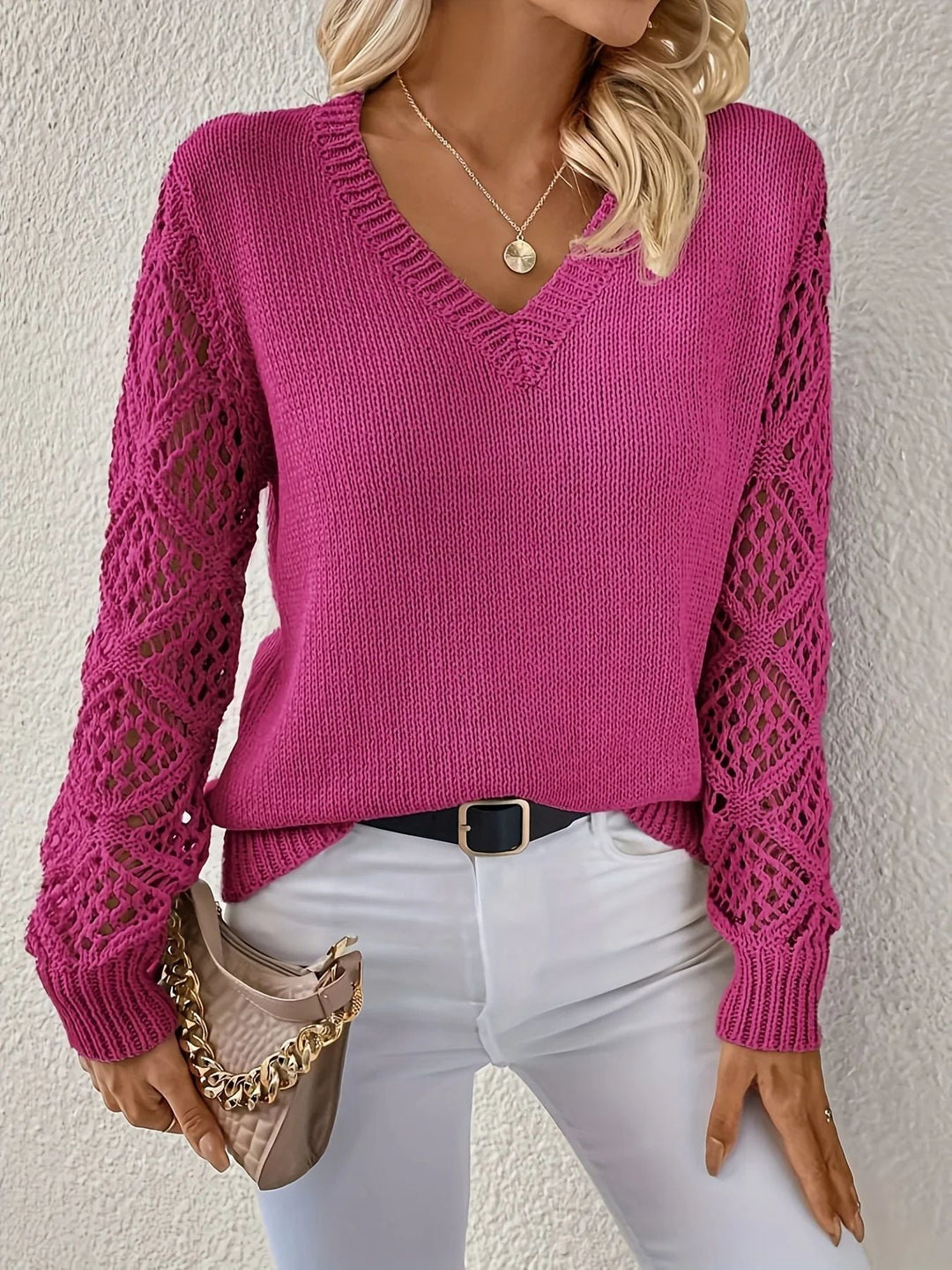 Dark pink open knit sweater with crochet sleeves, front view