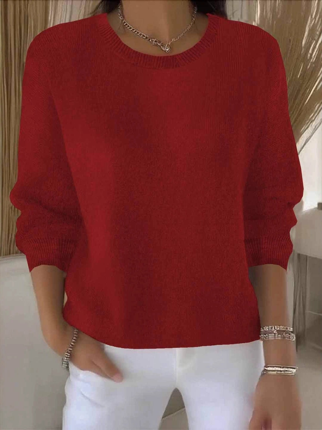 Red pullover sweater with ribbed crew neckline