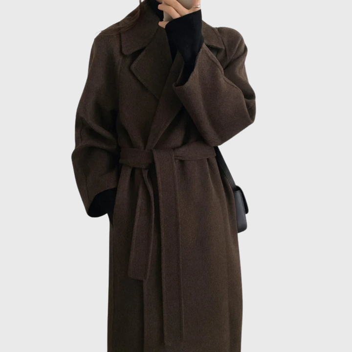 Model wearing dark brown belted longline coat
