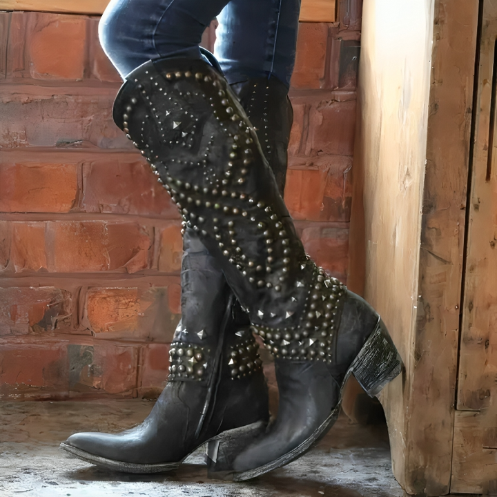 Black studded knee-high western boots side profile