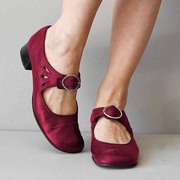 Red satin Mary Jane flats with buckle strap, front view on model