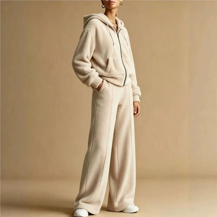 Woman wearing apricot sherpa hoodie and wide leg pants set