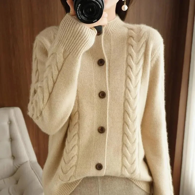 Off-white cable knit cardigan, front detail view