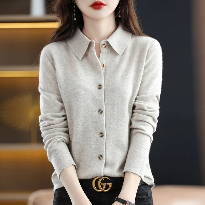 Beige knit cardigan with hands at waist