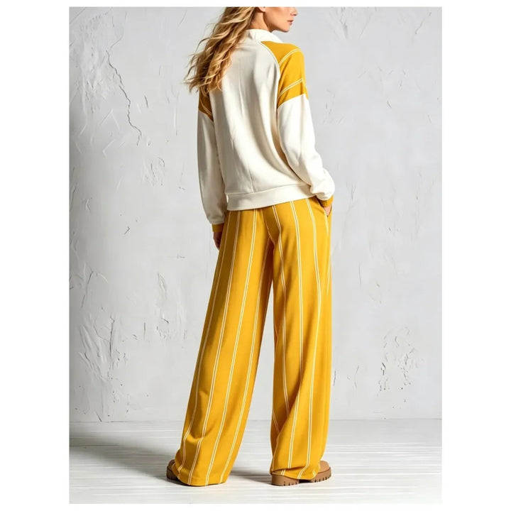 Back view of yellow color block pullover and striped wide leg pants set