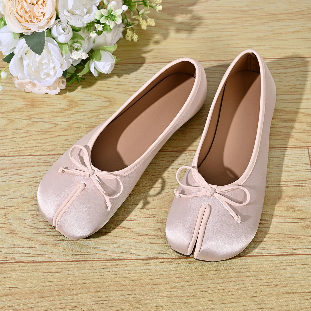Beige satin tabi ballet flats with bowknot detail
