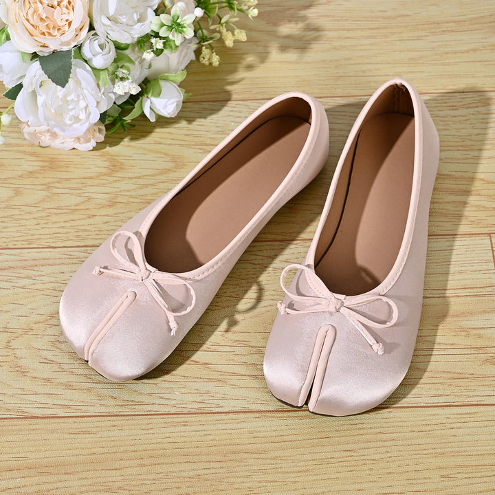 Beige satin tabi ballet flats with bowknot detail