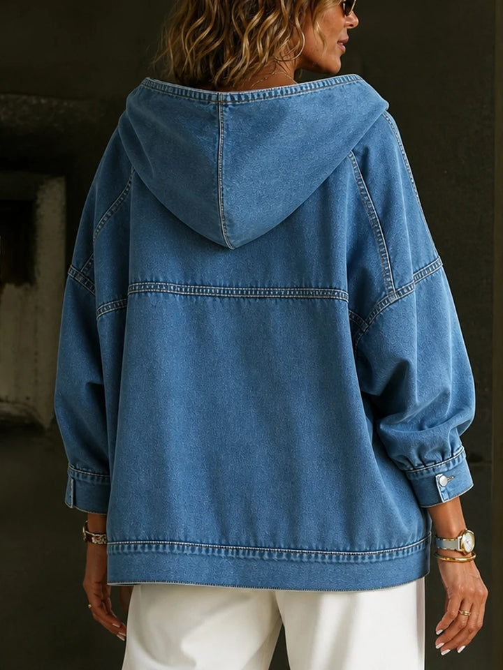 Back view of blue denim hoodie showing hood and topstitch seams