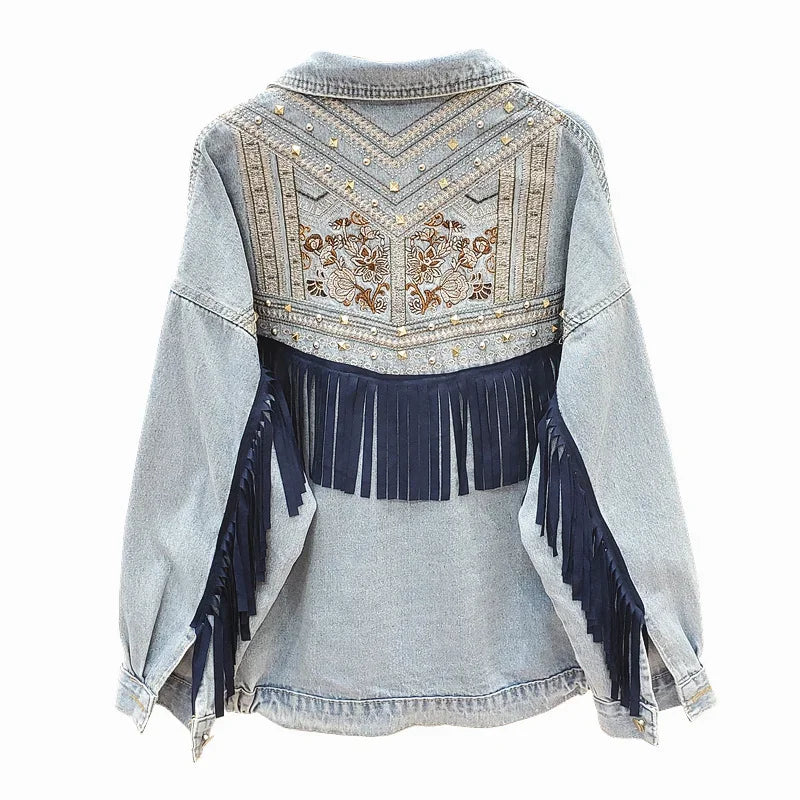 Denim jacket back view with embroidered yoke and navy suede fringe