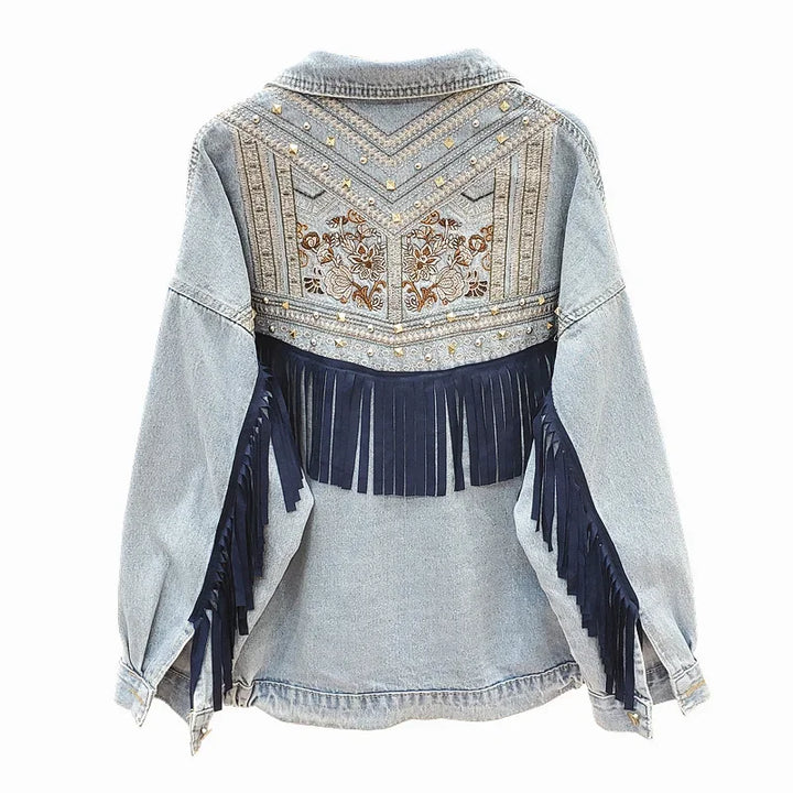 Denim jacket back view with embroidered yoke and navy suede fringe