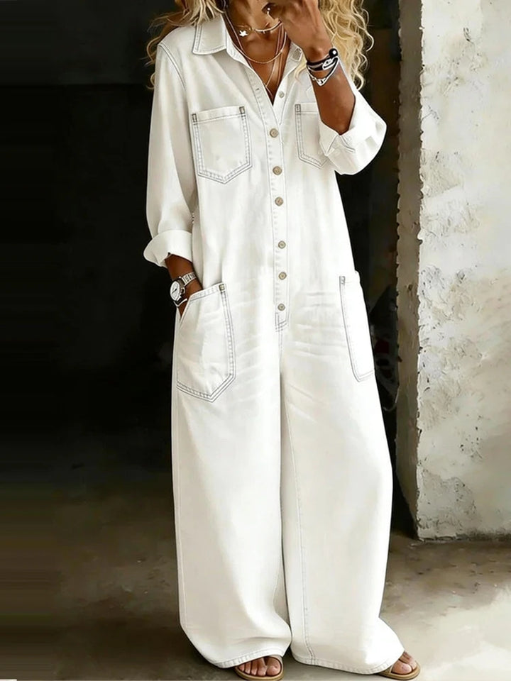 White denim jumpsuit with chest pockets and wide leg